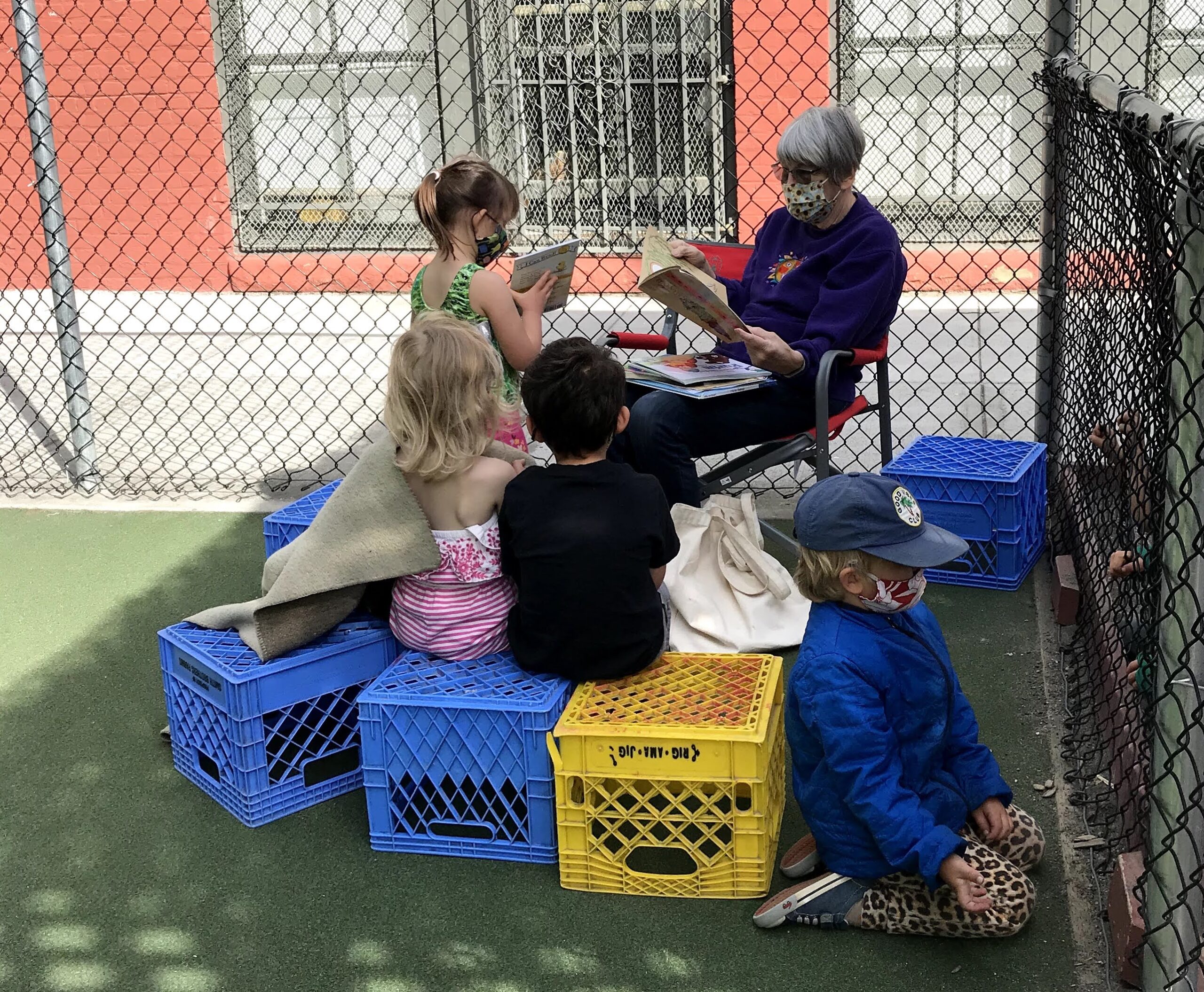 Companis volunteer Lee Campbell reads at University Heights.